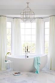 Bathroom Bay Window With Egg Shaped Tub Transitional Bathroom Master Bathroom Design Bathroom Window Treatments Bathroom Window Curtains