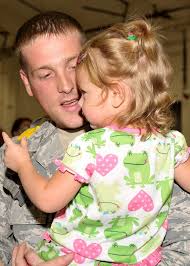 Bella Blier, 1, is greeted by her father U.S. Air Force