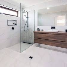 White bathroom with wood tones Top 60 Best White Bathroom Ideas Home Interior Designs Modern White Bathroom White Bathroom Bathroom Interior Design