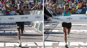Find quotes for your funny marathon signs here. Tanzanian Man And Peruvian Woman Win Life Time Miami Marathon Miami Herald