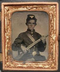 Blue is photographed sporting three remington revolvers and a sword. The American Civil War Soldier Motivation