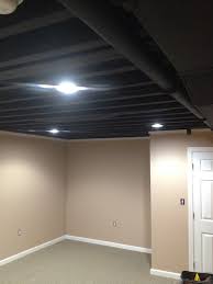 Black speakers and a projector can be mounted and blend into the paint color. Basement Traditional New York By Kd Painting Houzz