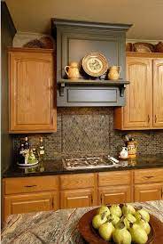 Honey oak cabinets should not be seen as a negative in a kitchen. Accent Oak Oak Kitchen Cabinets Kitchen Remodel Home Kitchens