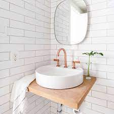 But how do you navigate the hundreds of options to find the best small powder room vanity for your particular needs? 15 Pretty Powder Room Ideas
