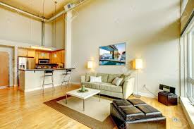 Fidi high ceiling apartment ⭐ , ⓜ fulton st, united states, new york state, new york city, maiden ln & broadway: Modern Loft Apartment Living Room Interior With Kitchen And High Stock Photo Picture And Royalty Free Image Image 17771862