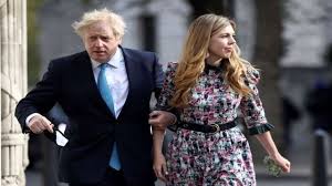 Carrie symonds opted for a £2,870 embroidered tulle white dress and a flower crown for her 'secret wedding' to prime minister boris johnson. Oasbxlmsysxy9m