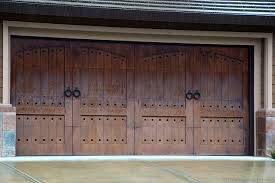 How can rustic wood garage doors impact the look of a home? Pin On For The Home