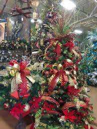Check out our home floral decor selection for the very best in unique or custom, handmade pieces from our shops. Cristhmas Tree Decorations Ideas Whimsical Red Gold And Green Christmas Tree Designed By Arcadia Floral And Home Decor Ask Christmas Home Of Christmas Inspiration Deals