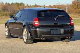 Image result for Brilliant Black 2010 Magnum