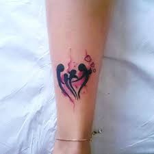 We Are One Watercolour Family Symbol Tattoo On The Wrist In Red And Black Tattoos Symbol Tattoos Symbol For Family Tattoo