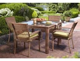 Comprising four high quality components, the set is designed as a conversational set, featuring a wide armrest sofa, two club chairs, and a central coffee table. Martha Stewart Living Charlottetown Brown All Weather Wicker 5 Piece Patio Furniture Dining Set With Green Bean Cushions Seats 4 Amazon Co Uk Garden Outdoors