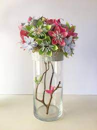 Maybe you would like to learn more about one of these? Wedding Centerpiece Origami Flowers Origami Centerpiece Wedding Bouquet Flower Bouquet By Branchingoffstudio On Origami Flowers Paper Flowers Origami Lily