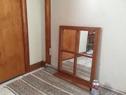 Barn window pane mirror and shutters looks great over our pew. Windowpane Wall Mirror Shelf Looks Like A Window Sill Wood Glass 1843582560