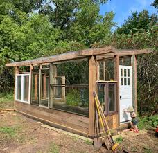 I collected the windows over the course of a year and a half and the build took abou… You Won T Believe This Diy Greenhouse Made Of Upcycled Windows And Doors Midwest Living