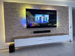 wohnwand wohnzimmer gestalten steinwand wohnzimmer wohnen