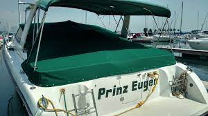 Cockpit Cover On A Silverton 38 Express Cruiser Suspended By 2 Mooring Poles Boat Covers Cockpit Cover