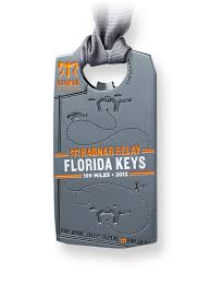 Only one team member runs at a time, with a total of three legs per runner. Ragnar Double Medals On Behance