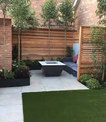 Contemporary Town Garden With Gas Fire Pit And Cedar Battens Patio Garden Design Outdoor Patio Designs Outdoor Landscape Design