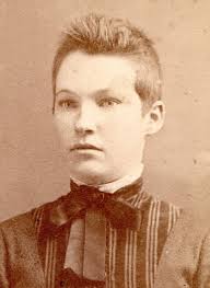 I'm beginning a long process of winnowing our possessions, including  organizing family photographs I've inherited. This one is of my mother's  mother's family, the Eastlick side. Taken in 1904: front row, right