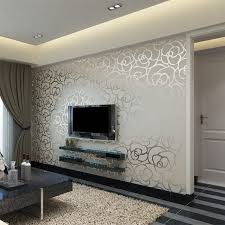 The papered wall becomes the center of attraction in this room. 1001 Breathtaking Accent Wall Ideas For Living Room