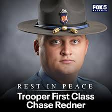 The Georgia State Patrol trooper was investigating a crash
