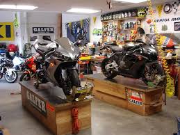 Our favorite motorcycle lift table is made mainly out of wood, but it doesn't feature the same mechanical action as a professional lift table. Share Your Motorcycle Work Bench Pictures Here South Bay Riders