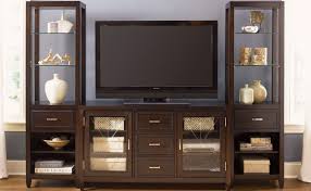 Choose from simple metal stands to traditional cabinets with storage space. Caroline Entertainment Center With Side Curio Cabinets