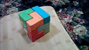 Sean @ make points us to this nifty polycube puzzle folded out of paper by qiao chang. What Puzzles Can I Make Out Of Origami Puzzling Stack Exchange