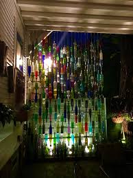 People collect bottles for various reasons, but probably the best use for them is this project. Garden Art A Brilliant Wine Bottle Wall