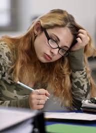 Dedicated teacher helping students navigate the path to college