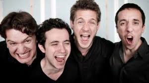 (l) a man sits by the wreckage of a truck after it was blown up with an improvised explosive device amid fighting in yemen's capital sanaa; Quatuor Ebene Interlude