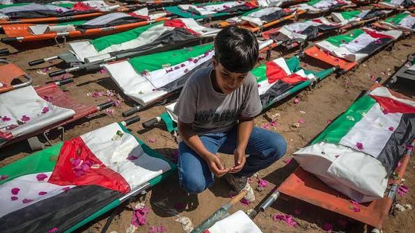 Mass funeral in Gaza for 112 Palestinians killed in 2023 Israeli strike