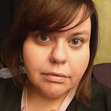 Not 100% sure but I think it's an Australian Shepherd. It's running  directly in front of cars right past Jeanette's here. If you're going  northbound, it was running northbound. The tag on