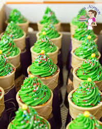 Hmmmm… wondering what to do with all those easter peeps? Ice Cream Cone Christmas Tree Cupcakes Veena Azmanov