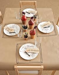 Another Kids Table Idea Covered In Paper Crayons In Little Pots Drawn Placemats So Thanksgiving Table Decorations Thanksgiving Kids Table Kids Party Tables
