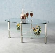 The coffee table includes tempered glass tops with frosted glass shelves, and steel finished pillar legs. Valufurniture Cara Oval Clear And Frosted Glass Coffee Table Buy Online In Angola At Angola Desertcart Com Productid 59030746