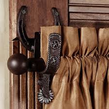 Cowboy home decor is indeed eligible for boys' bedrooms and there are some treatments for transforming the bedrooms into such cowboy style bedrooms. Cowboy Home Decor