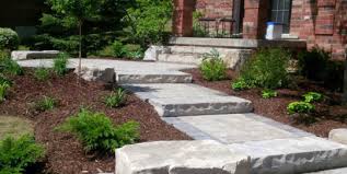 Garden images showing how large garden stepping stones transform beautiful garden walkways and paths. Natural Stone Manor Landscaping