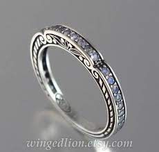 Caryatid Wedding Band In Sterling Silver With Moonstones Etsy In 2021 Silver Wedding Bands Wedding Bands Jewelry
