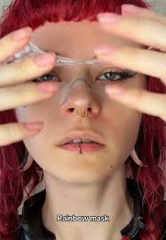 Guy with Beanie and Tiger Rainbow Mask Video