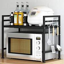 X design on the back ensures stability and durability, preventing utensils from dropping. Amazon Com Pusdon Extendable Microwave Oven Rack Adjustable Microwave Toaster Shelf Heavy Duty Stand Kitchen Counter Top Organizer L15 7 23 6 Xw12 6 Xh18 9 2 Tier With 3 Hooks 66lbs Weight Capacity Black Standing Baker S Racks