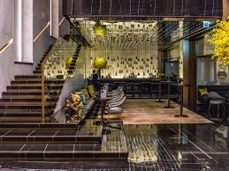 The design is straight up and down the structural design of a floating staircase requires expert engineering so always consult a. Free Images Yellow Architecture Building Interior Design Lobby Stairs Wall Floor Room Furniture Material Property House Flooring Chair Home Tile Ceiling Wood Table Plant Glass Facade Metal 8192x6140 1528863