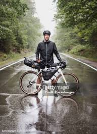 Image result for rain cyclist