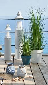 Wenn Der Wind Auf Dem Balkon Oder Der Terrasse Durch Die Graser Weht Traumen Wir Uns An Den Strand Windlichter Garten Garten Pflanzen Gartendekoration