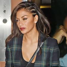 Glum Nicole Scherzinger dresses down