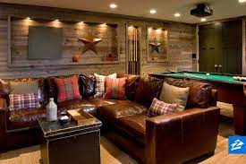 A Giant Leather Couch And Reclaimed Wood Walls Transform This Game Room Into The Perfect Rustic Oasis Rustic Game Room Home Pool Table Room
