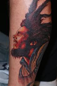 Bob marley uprising lower back updated. Color Bob Marley Tattoo On Sleeve By Justin Jakus