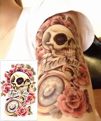 This skull and rose tattoo looks beautiful due to the addition of leaves too. Freedom Skull Roses Sleeve Tattoo Tattooforaweek Temporary Tattoos Largest Temporary Tattoo Shop Worldwide Tattooforaweek Product Info Halloween Yl F32 12