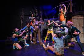 He stands above the boys on a boulder, holding a spear. Pride S Flies The Musical Flies In The Face Of The Lord Of The Flies In An Unauthorized Parody