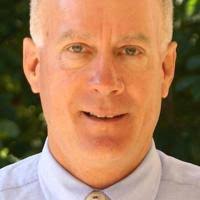 Matthews retiring after 22 years as AD at alma mater Washington